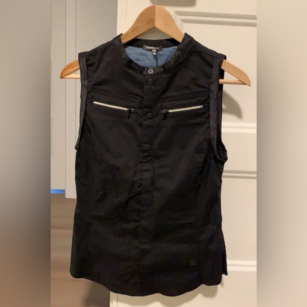 Diesel sleeveless top.  Brand new with tag.  Purchased too small.